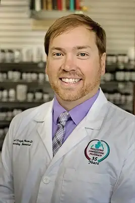Eddie Wright, PharmD., ABAAHP, FAAMM
